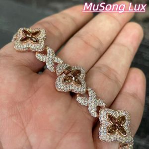 VVS Moissanite 925 Sterling Silver Miami Bracelet 9mm 8 inches, rose gold set with brown gemstones.