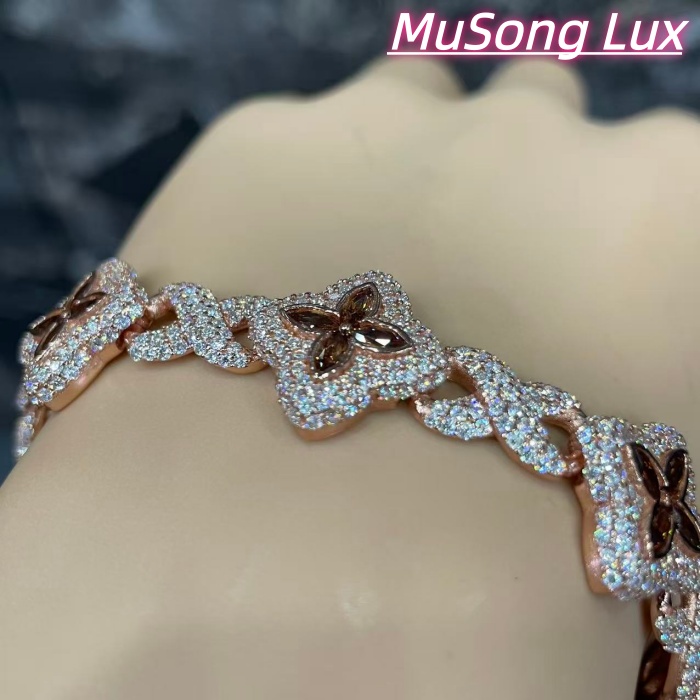 VVS Moissanite 925 Sterling Silver Miami Bracelet 9mm 8 inches, rose gold set with brown gemstones.