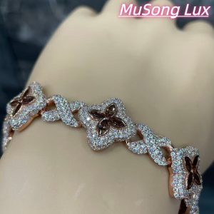 VVS Moissanite 925 Sterling Silver Miami Bracelet 9mm 8 inches, rose gold set with brown gemstones.