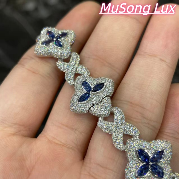VVS Moissanite 925 Sterling Silver Miami Bracelet 9mm 8 inches, set with blue gemstones.