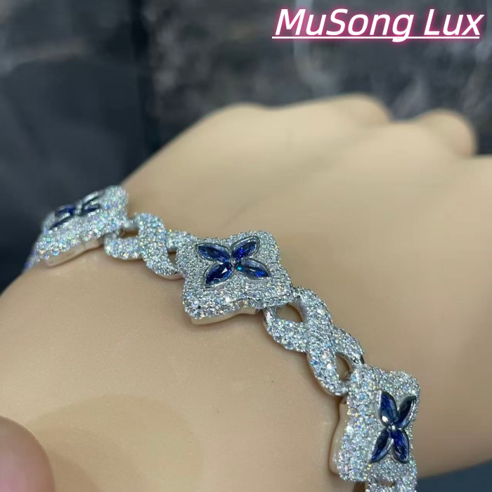 VVS Moissanite 925 Sterling Silver Miami Bracelet 9mm 8 inches, set with blue gemstones.