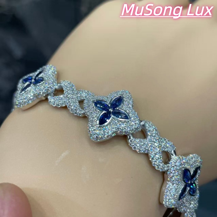 VVS Moissanite 925 Sterling Silver Miami Bracelet 9mm 8 inches, set with blue gemstones.