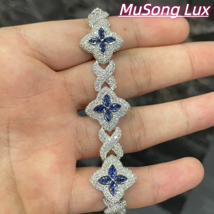 VVS Moissanite 925 Sterling Silver Miami Bracelet 9mm 8 inches, set with blue gemstones.