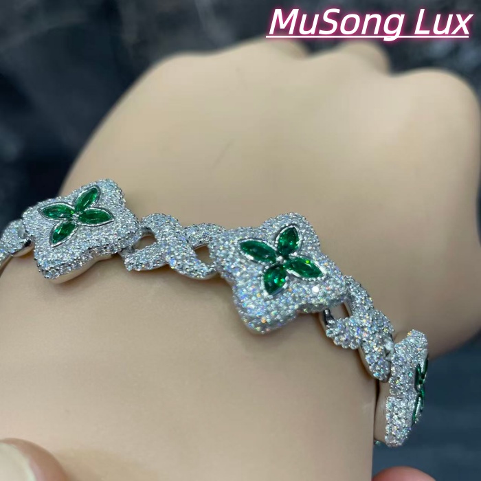 VVS Moissanite 925 Sterling Silver Miami Bracelet 9mm 8 inches, set with green gemstones.
