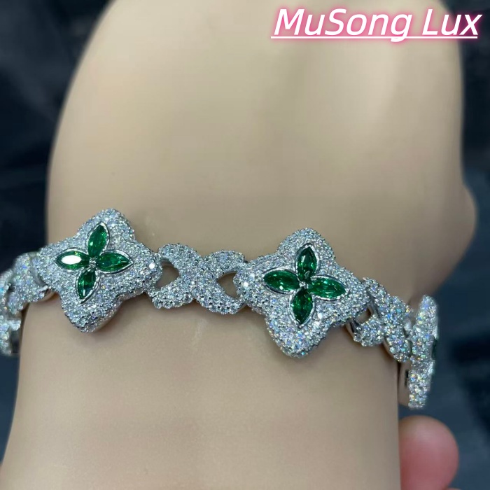 VVS Moissanite 925 Sterling Silver Miami Bracelet 9mm 8 inches, set with green gemstones.