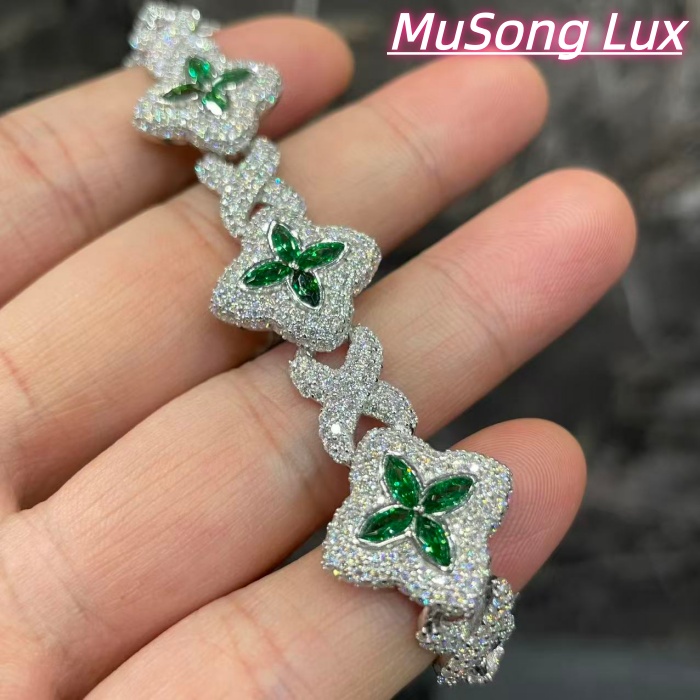 VVS Moissanite 925 Sterling Silver Miami Bracelet 9mm 8 inches, set with green gemstones.