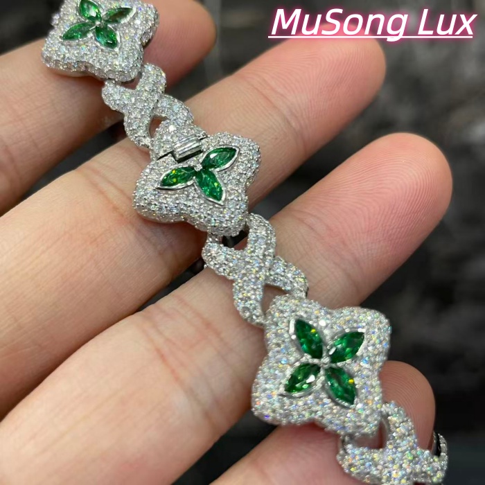 VVS Moissanite 925 Sterling Silver Miami Bracelet 9mm 8 inches, set with green gemstones.